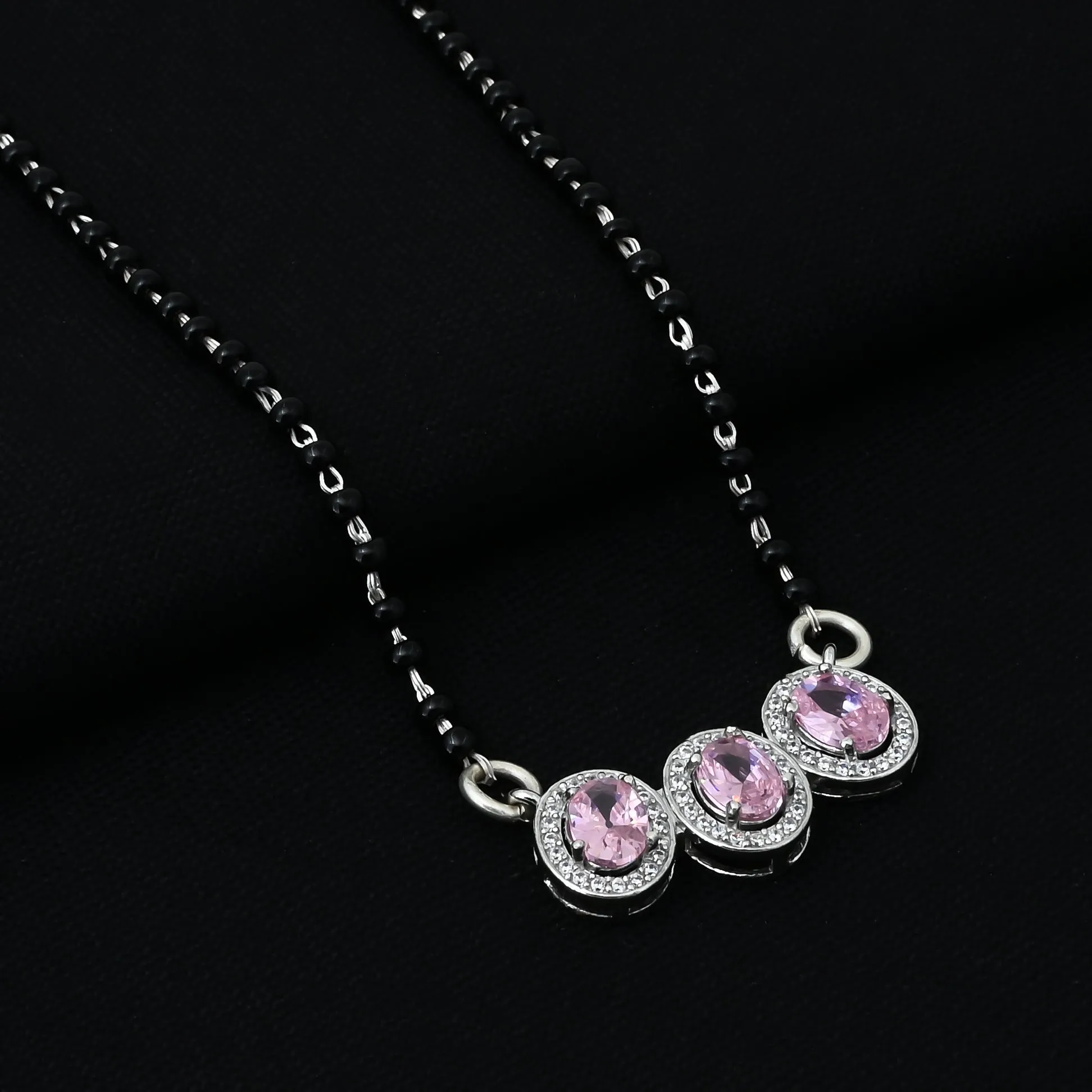 Beautiful Mangalsutra Adorned with a Pink Sapphire and American Diamonds