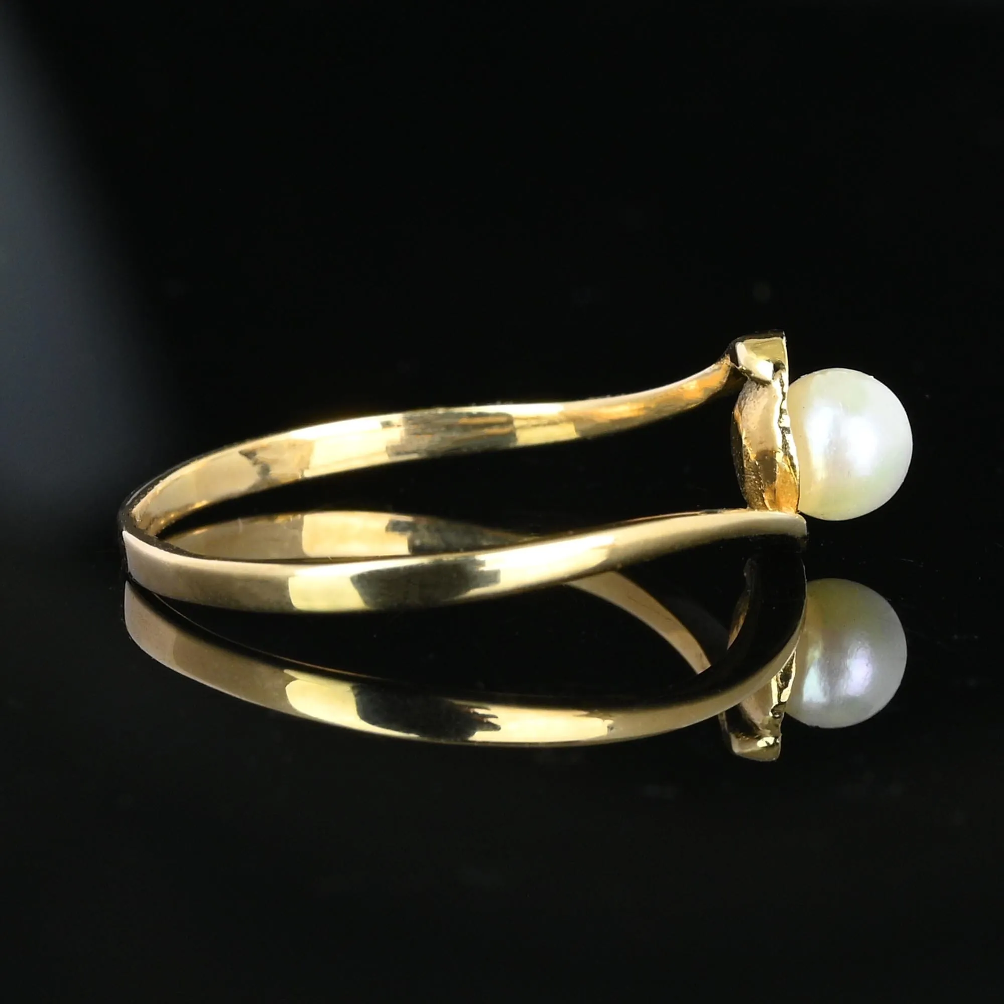 Elegant 14K Gold Bypass Pearl Solitaire Ring